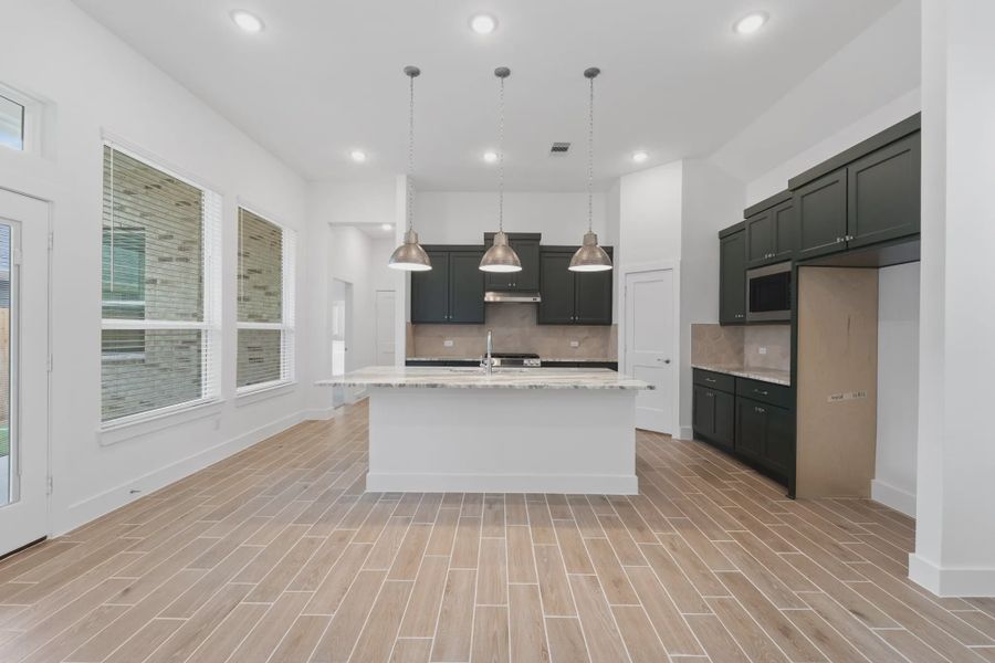 Image 41 representing the Augusta by Chesmar Homes in Riceland Alley Loads, Mont Belvieu, TX.