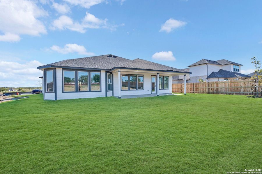 Exterior details and patio area of a home in Preserve at Annabelle Ranch, San Antonio (Image 4).
