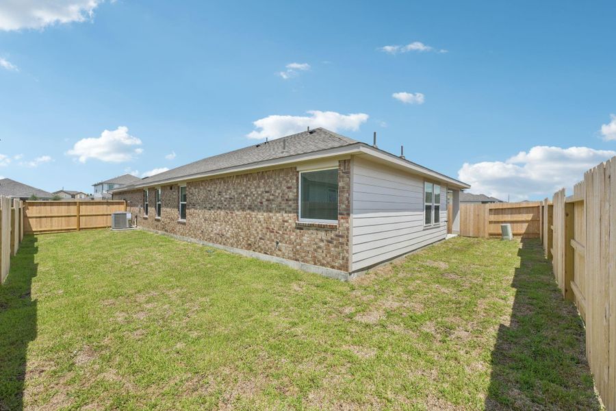 Front exterior of a new home in Heights of Barbers Hill, Mont Belvieu, TX, highlighting curb appeal (Image 1). Front exterior of a new home in Heights of Barbers Hill, Mont Belvieu, TX, highlighting curb appeal (Image 1).