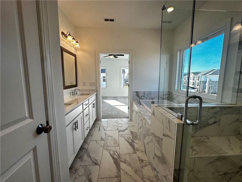 Additional linen closet in owners Bathroom