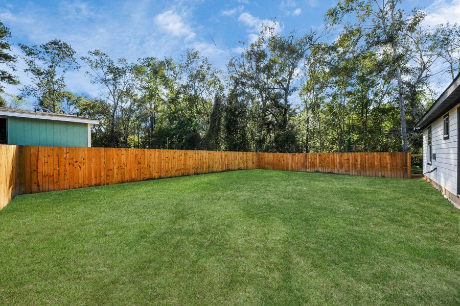 Exterior details and patio area of a home in , Splendora (Image 3).