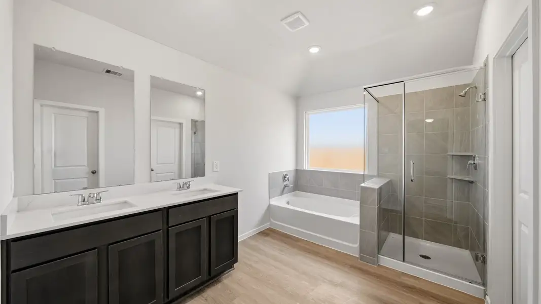 Furnished interior view inside a new home in Sunterra Lakes, Brookshire (Image 9).