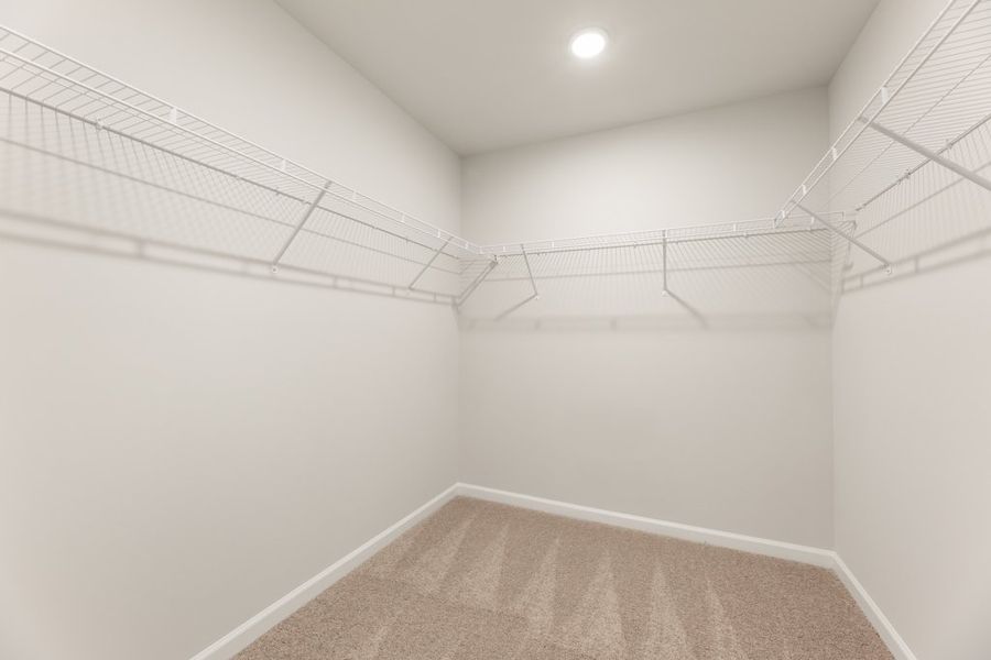 A white hallway with a light.