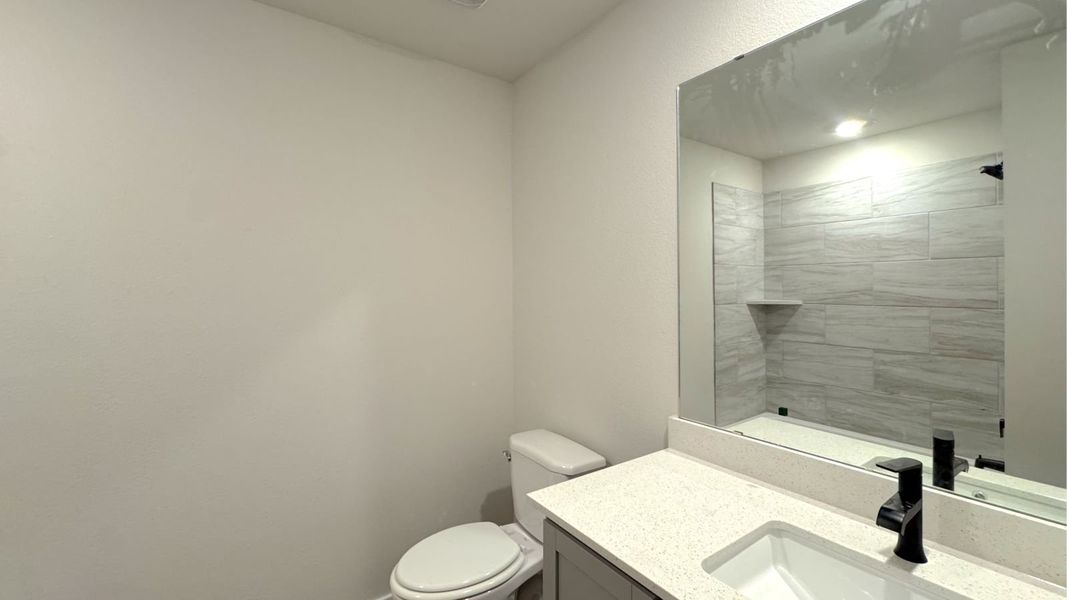 Furnished interior view inside a new home in King's Landing, Corpus Christi (Image 8).