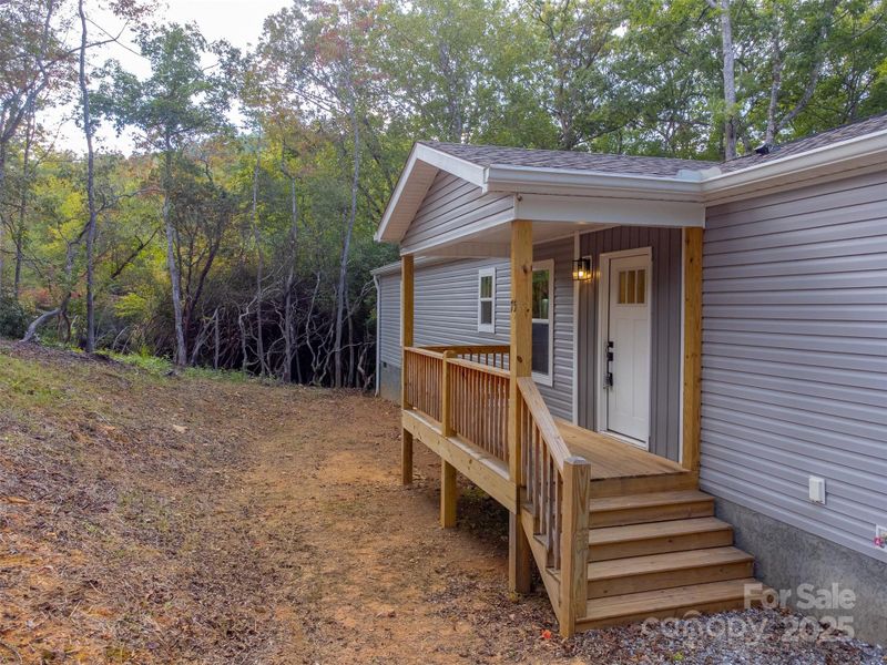 Exterior details and patio area of a home in , Hayesville (Image 21).