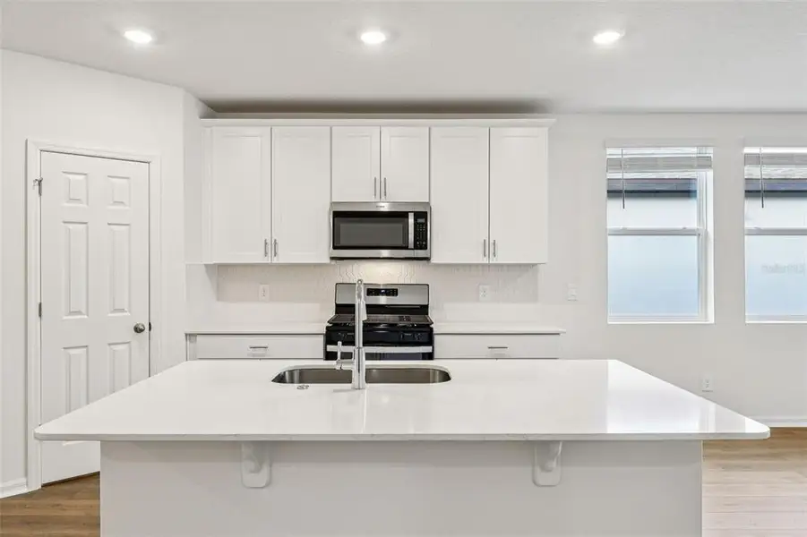 Furnished interior view inside a new home in The Reserve at Twin Lakes, St. Cloud (Image 6).