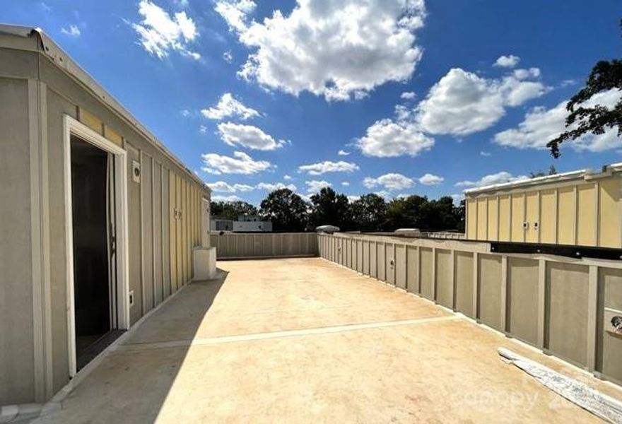 Exterior details and patio area of a home in , Charlotte (Image 7). Exterior details and patio area of a home in , Charlotte (Image 7).