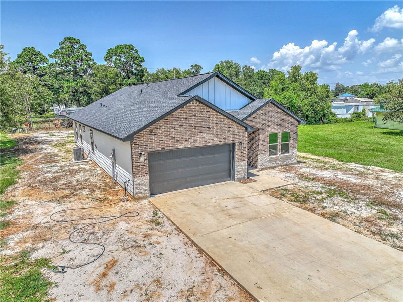Front exterior of a new home in , Livingston, TX, highlighting curb appeal (Image 19). Front exterior of a new home in , Livingston, TX, highlighting curb appeal (Image 19).