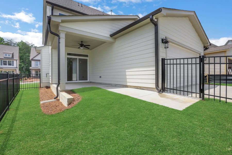 Exterior details and patio area of a home in Marble Tree, Ball Ground (Image 15).