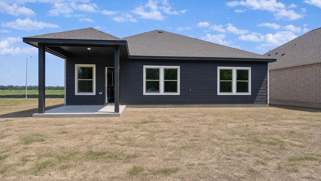 Exterior details and patio area of a home in Sundance Cove, Crosby (Image 3).