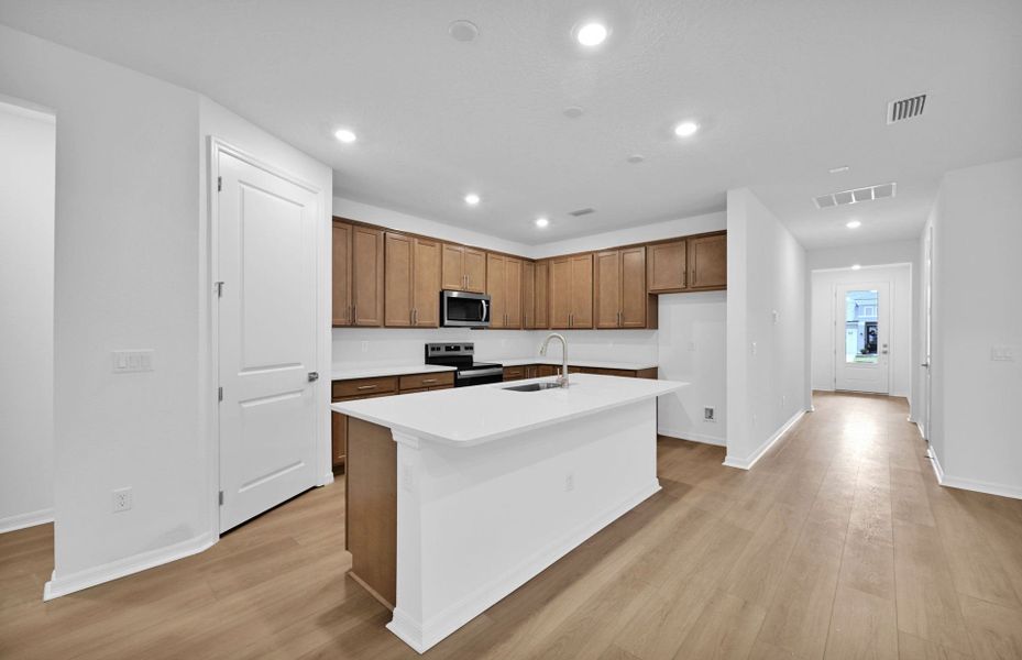 Furnished interior view inside a new home in Hyland Trail, Green Cove Springs (Image 4).