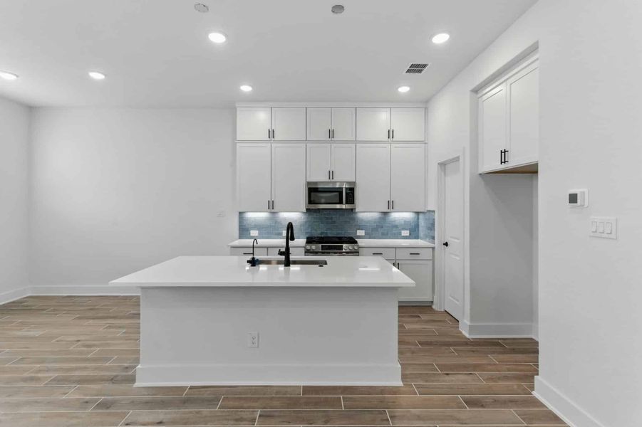 Furnished interior view inside a new home in Rose Hill, San Antonio (Image 6).