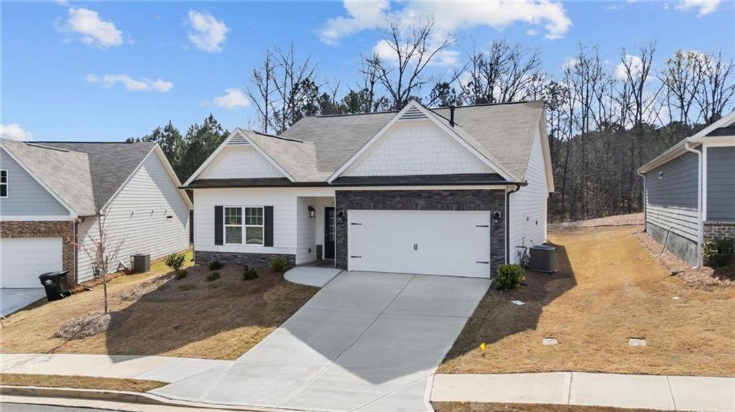 Front exterior of a new home in Villages at Cedar Hill, Dallas, GA, highlighting curb appeal (Image 27).