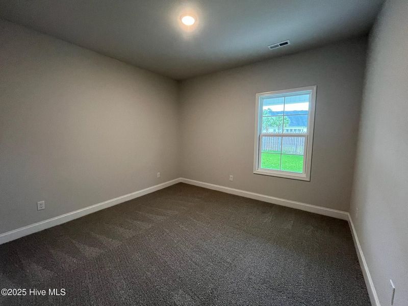 Spacious, unfurnished interior of a new home in Palmetto Creek, Bolivia (Image 19).