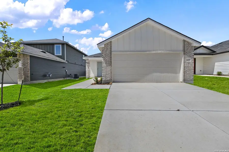 Front exterior of a new home in Hickory Ridge, Elmendorf, TX, highlighting curb appeal (Image 2).
