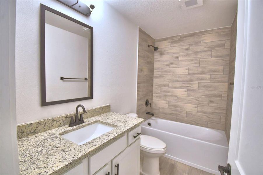 Furnished interior view inside a new home in Lake Juliana Estates, Auburndale (Image 10).