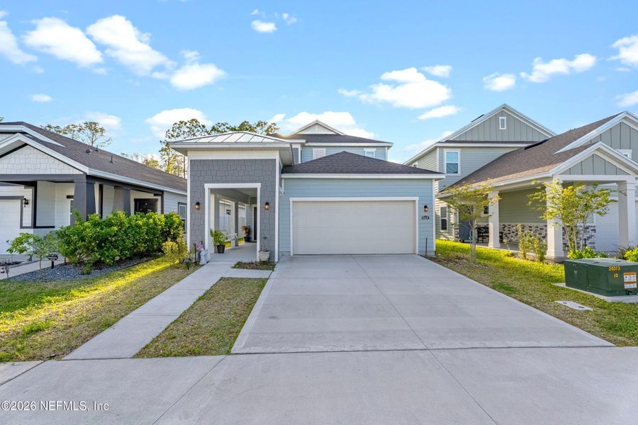 Front exterior of a new home in , Fernandina Beach, FL, highlighting curb appeal (Image 21).
