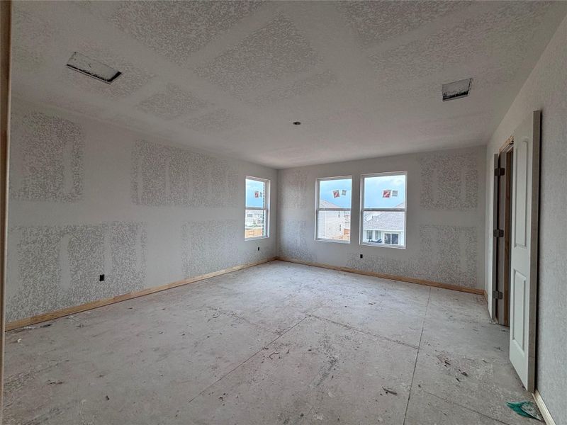 Spacious, unfurnished interior of a new home in The Colony 45s, Bastrop (Image 18).