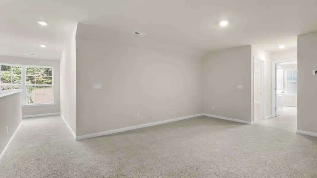 Spacious, unfurnished interior of a new home in The Villas at Galvins Ridge, Sanford (Image 31).