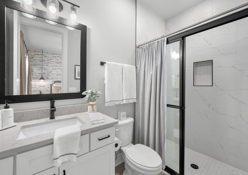 Beautiful secondary bathroom with walk-in shower.