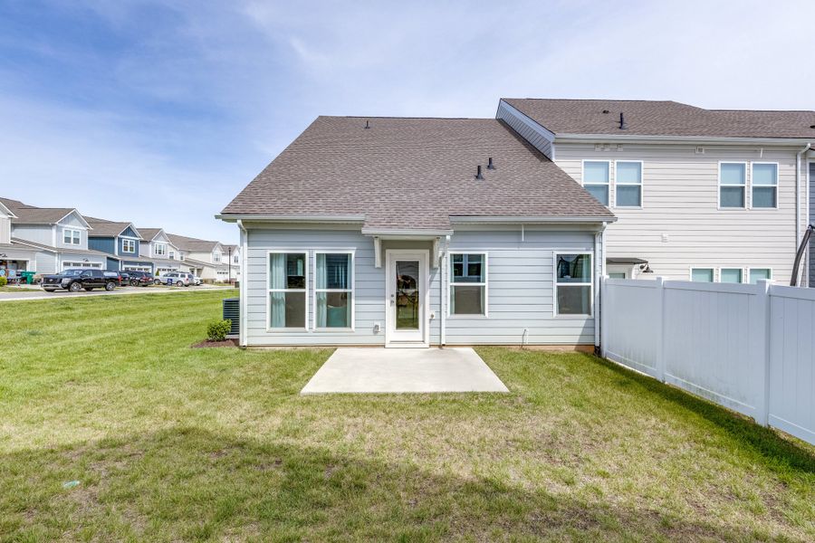 Exterior details and patio area of a home in Harvest Point, Spring Hill (Image 4).