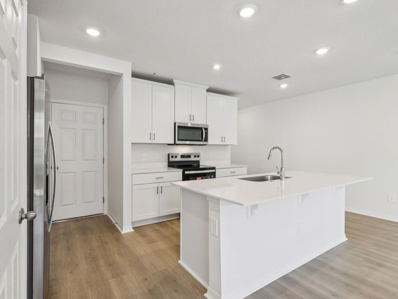 Furnished interior view inside a new home in The Meadow at Crossprairie Townes, St. Cloud (Image 4). Furnished interior view inside a new home in The Meadow at Crossprairie Townes, St. Cloud (Image 4).