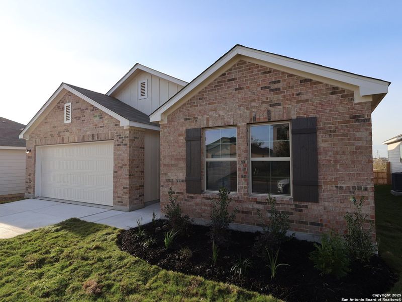 Front exterior of a new home in Paloma Park, Converse, TX, highlighting curb appeal (Image 20).