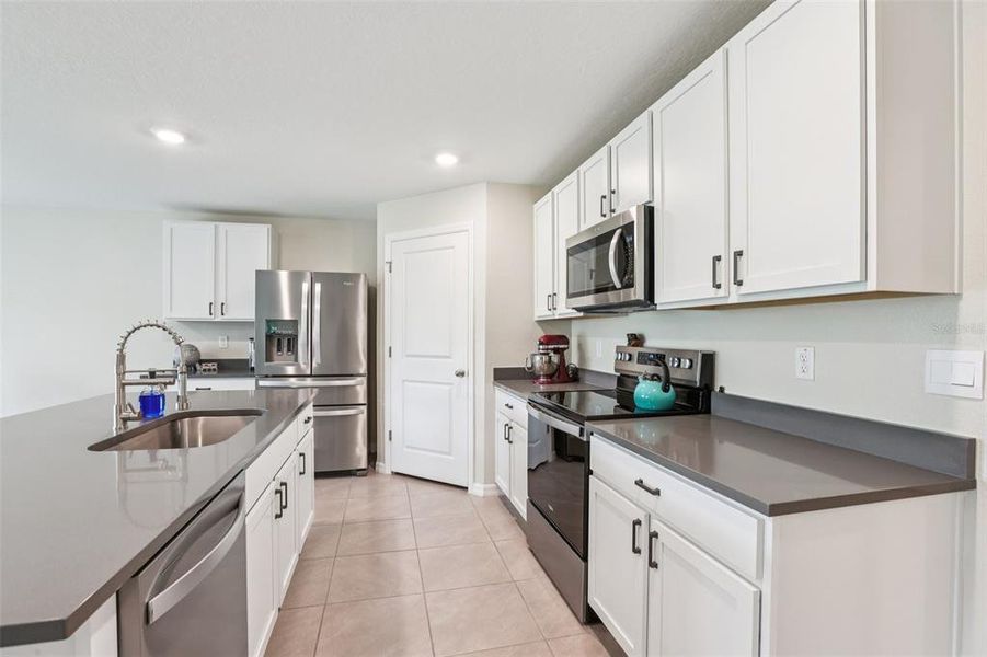 Furnished interior view inside a new home in North Park Isle, Plant City (Image 12).