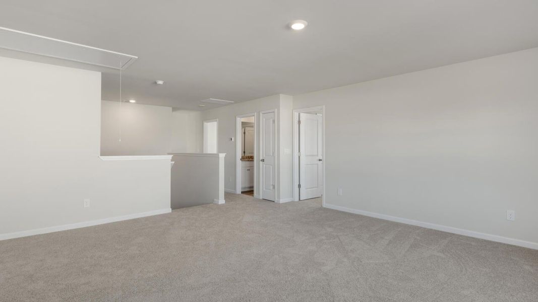 Spacious, unfurnished interior of a new home in The Haven at Indigo Preserve, Leland (Image 29).