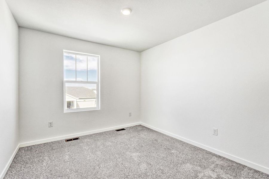 Spacious, unfurnished interior of a new home in Muegge Farms, Bennett (Image 10).