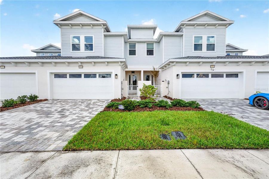 Front exterior of a new home in , Wesley Chapel, FL, highlighting curb appeal (Image 21).