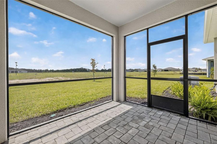 Exterior details and patio area of a home in Windwater, Parrish (Image 3).