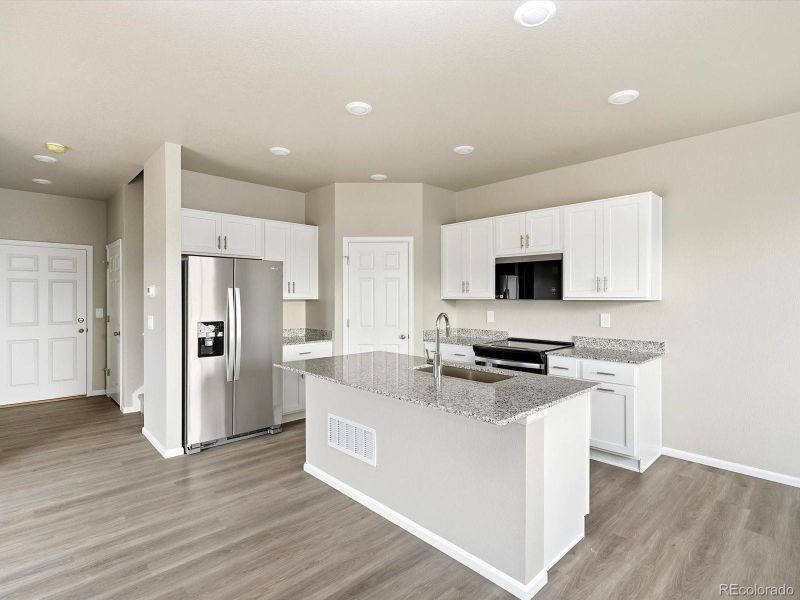 Furnished interior view inside a new home in York Station, Thornton (Image 7).