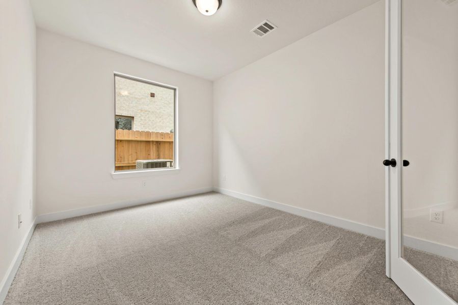 Spacious, unfurnished interior of a new home in The Groves, Humble (Image 15).