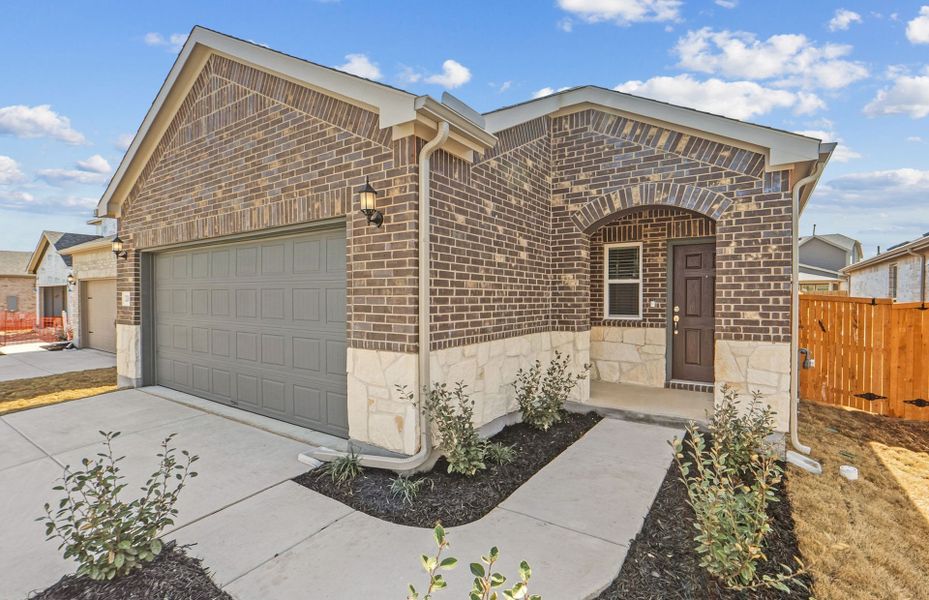 Exterior details and patio area of a home in Crosswinds, Kyle (Image 21).