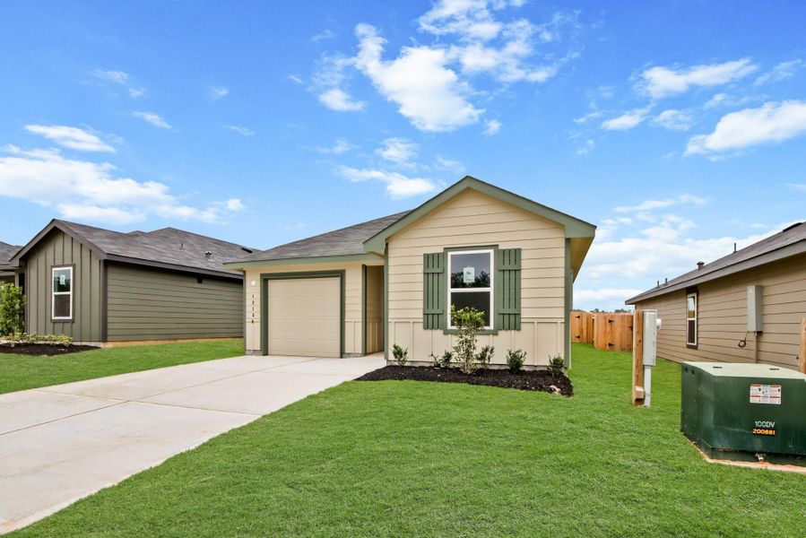 Front exterior of a new home in McCrorey Trails, Conroe, TX, highlighting curb appeal (Image 6). Front exterior of a new home in McCrorey Trails, Conroe, TX, highlighting curb appeal (Image 6).