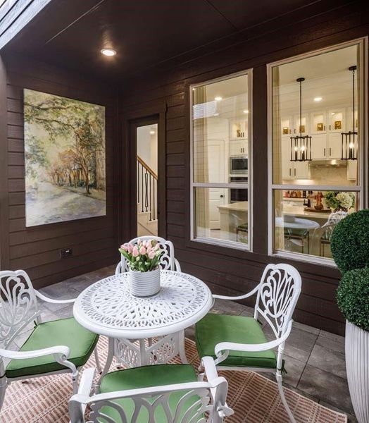 Exterior details and patio area of a home in Woodforest Townhomes, Montgomery (Image 3).