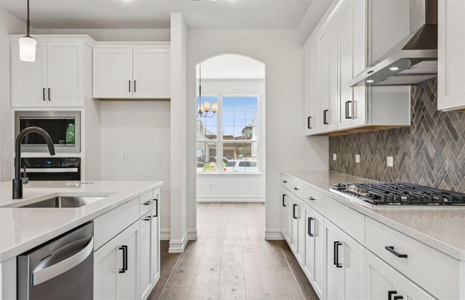 High-end gourmet kitchen with premium finishes and upgraded appliances *Model representation High-end gourmet kitchen with premium finishes and upgraded appliances *Model representation