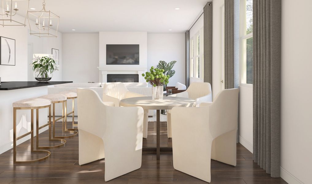 Cozy dining area and kitchen with gorgeous floors