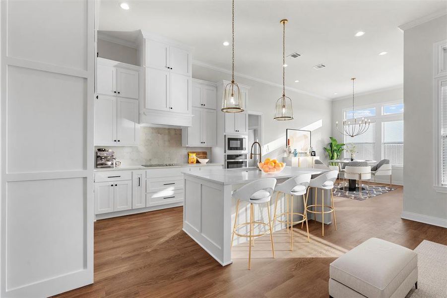 Kitchen with decorative backsplash, crown molding, light stone counters, open floor plan, and a kitchen breakfast bar Kitchen with decorative backsplash, crown molding, light stone counters, open floor plan, and a kitchen breakfast bar