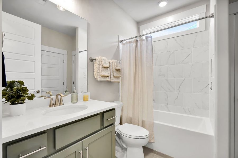 Furnished interior view inside a new home in The Bluffs On the Cape Fear, Leland (Image 38).