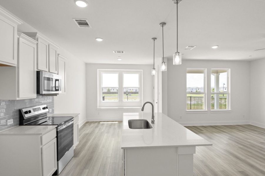 Furnished interior view inside a new home in Avery Centre, Round Rock (Image 8).