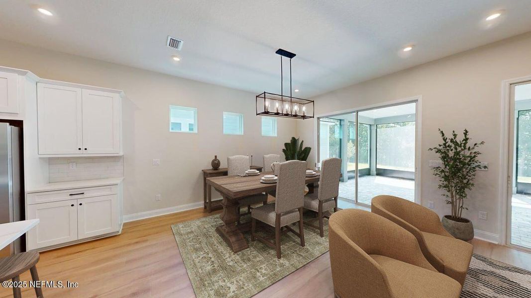 Furnished interior view inside a new home in RiverTown - WaterSong, St. Johns (Image 6).