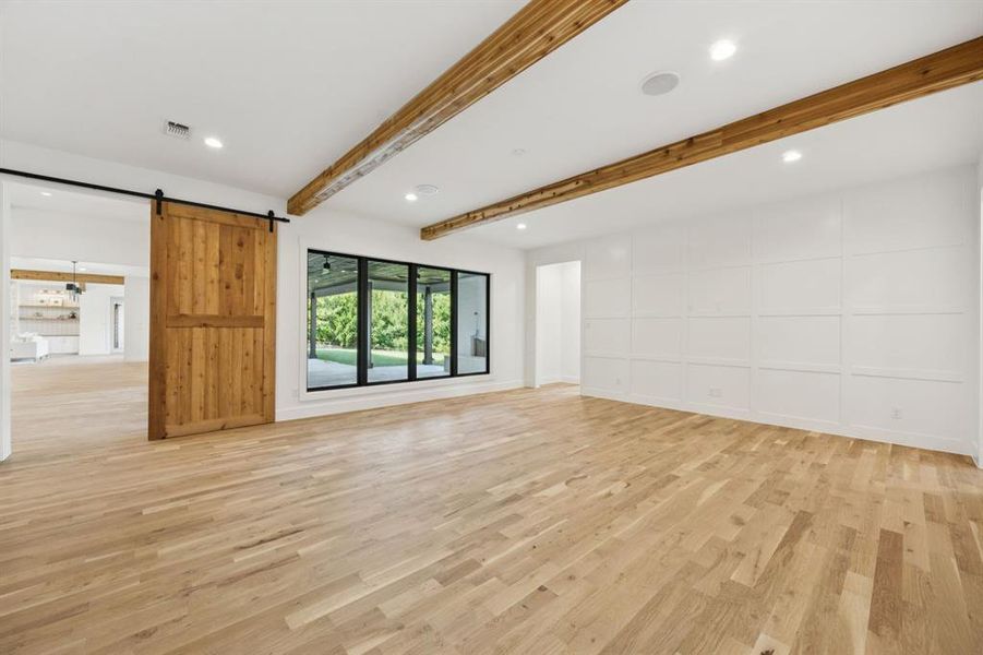 First level game room enjoys beautiful views of the backyard. First level game room enjoys beautiful views of the backyard.