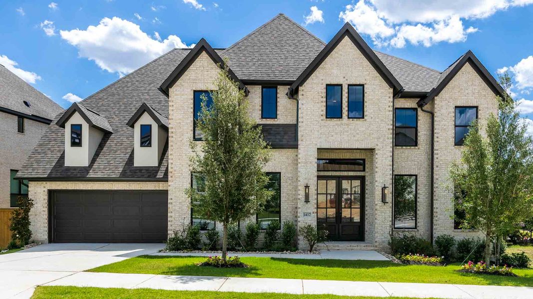Front exterior of a new home in Palmera Ridge, Leander, TX, highlighting curb appeal (Image 1). Front exterior of a new home in Palmera Ridge, Leander, TX, highlighting curb appeal (Image 1).