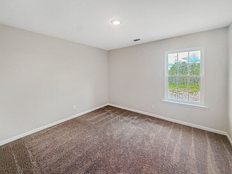 Spacious, unfurnished interior of a new home in The Village at Sassafras, Allenhurst (Image 24).