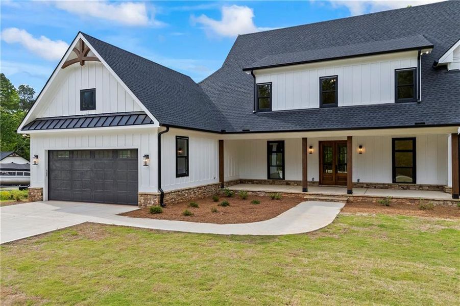 Front exterior of a new home in , Flowery Branch, GA, highlighting curb appeal (Image 41).