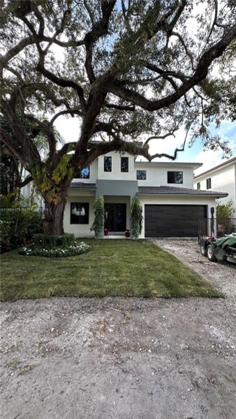 Front exterior of a new home in , Miami, FL, highlighting curb appeal (Image 2). Front exterior of a new home in , Miami, FL, highlighting curb appeal (Image 2).