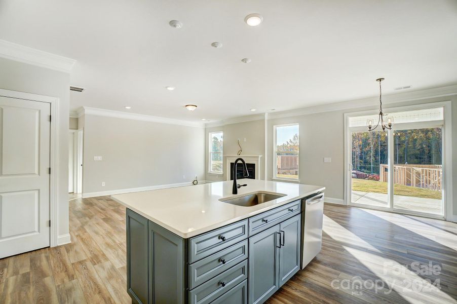 This home features all white cabinets and island