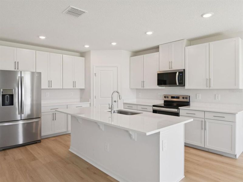 Furnished interior view inside a new home in Oakfield Trails - Classic Series, Parrish (Image 8).